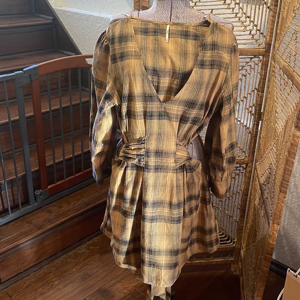 Fall vibes, flannel dress from Free People Size: 8; Pair with some docs